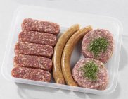 Cevapcici with sausages and burgers — Stock Photo