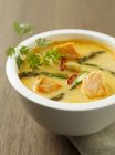 Salmon soup with asparagus — Stock Photo