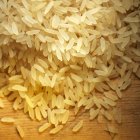 Heap of long-grain rice — Stock Photo