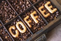 Word 'coffee' written of beans — Stock Photo