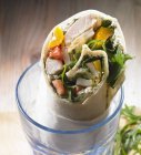 Wrap with chicken in glass jar — Stock Photo