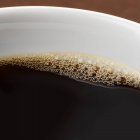 Black coffee in cup — Stock Photo