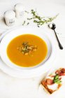 Pumpkin soup and bruschetta — Stock Photo