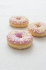 Stawberry-glazed doughnuts — Stock Photo