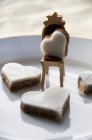 Closeup view of Rum hearts and small chair on plate — Stock Photo
