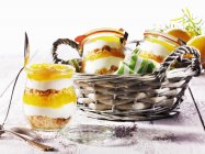 Orange cheesecake in jars — Stock Photo