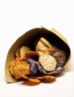Potato crisps in a paper bag — Stock Photo