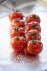 Vine tomatoes ready for roasting — Stock Photo