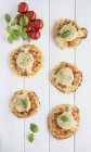 Mini pizzas with cheese — Stock Photo