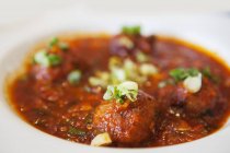 Navratna Korma - braised vegetarian curry  on white plate — Stock Photo