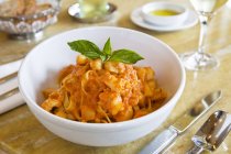 Tagliatelle pasta with fish — Stock Photo