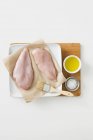 Chicken fillets with olive oil and salt — Stock Photo