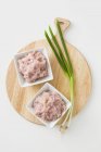 Minced chicken and spring onions — Stock Photo