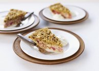 Slices of rhubarb crumble tart — Stock Photo