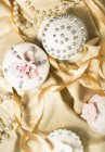 Cupcakes decorated with silver pearls — Stock Photo