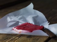 Beef steak on paper — Stock Photo
