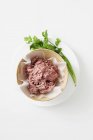 Minced pork in paper-lined bowl on — Stock Photo