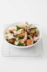 Mixed seafood with fish and parsley — Stock Photo