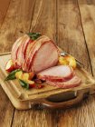 Roasted ham with bacon — Stock Photo