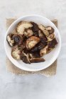 Top view of fresh Shiitake mushrooms in a bowl — Stock Photo