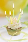 Cupcake with birthday candles — Stock Photo