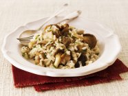 Risotto rice with forest mushrooms — Stock Photo