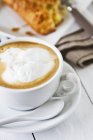Cappuccino with milk foam — Stock Photo