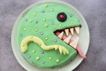 Monster cake decorated with marzipan — Stock Photo