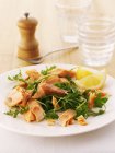Smoked trout and rocket salad — Stock Photo