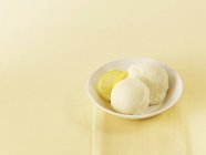 Scoops of lemon sorbet — Stock Photo