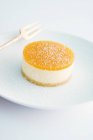 Passion fruit tartlet with icing sugar — Stock Photo