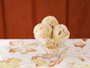 Caramel ice cream in a sundae glass — Stock Photo