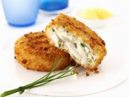 Haddock fish cakes with chives — Stock Photo