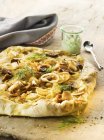 Closeup view of onion flatbread pie with dill — Stock Photo
