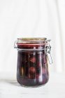 Jar of cherry compote — Stock Photo