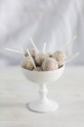 Cake pops in an ice cream bowl — Stock Photo