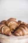 Fresh croissants on plate — Stock Photo