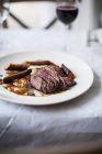 Saddle of venison with carrots — Stock Photo