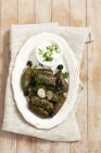 Vine leaves stuffed with rice — Stock Photo