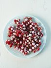 Plate of frozen redcurrants — Stock Photo