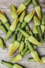 Fresh Baby courgettes with flowers — Stock Photo