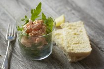 Shrimp cocktail with bread — Stock Photo