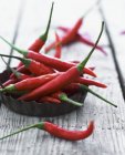 Red chillies on the plate — Stock Photo