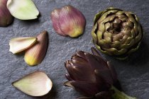 Fresh Artichokes with leaves — Stock Photo