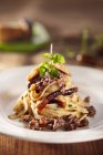 Tagliatelle pasta with wild boar ragout — Stock Photo
