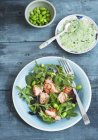 Leaf salad with hot smoked salmon — Stock Photo