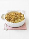 Closeup view of apple Crumble in bowl — Stock Photo
