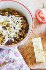 Chilli con carne with cheddar — Stock Photo