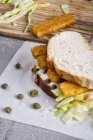 Fishfinger sandwich with sauce — Stock Photo