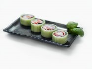 Cucumber maki sushi with prawns — Stock Photo